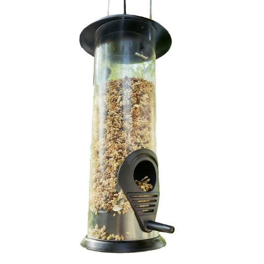 Mangeoire Pour Oiseaux Du Jardin remplie de graines